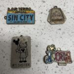 Four different keychain charms.